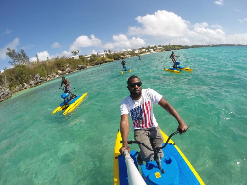 An African American man takes a "selfie" of himself on a Hydro Bike