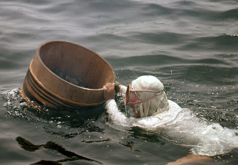 Ama Diver with bucket to hold her catch