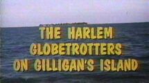 Title card from the TV movie The Harlem Globetrotters on Gilligan’s Island, featuring large yellow text against an ocean background with a small island visible in the distance.