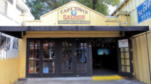 The front facade of Capt. Tony's Saloon in Key West, Florida, featuring its iconic sign that reads "Capt. Tony's Saloon - First and Original Sloppy Joe's Bar 1933-1937." The saloon is famous for its connection to Jimmy Buffett and Captain Tony Tarracino.
