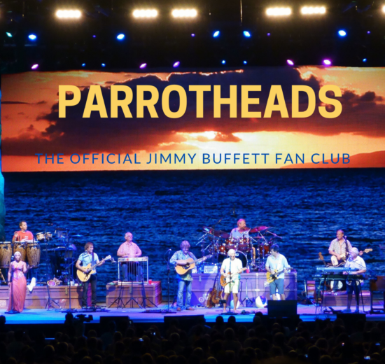 A live band performs on stage with a tropical-themed background featuring a sunset over the ocean and the text "Parrotheads, The Official Jimmy Buffett Fan Club